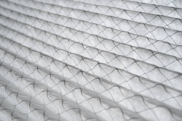 Close-up of pleated HVAC air filters showing media texture