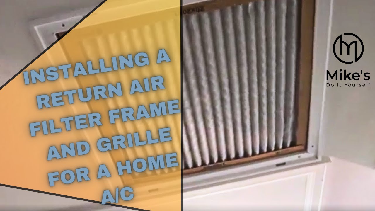 Technician installing air filter in ceiling return air grille